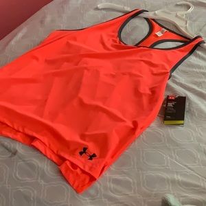 Orange Under Armour top.
